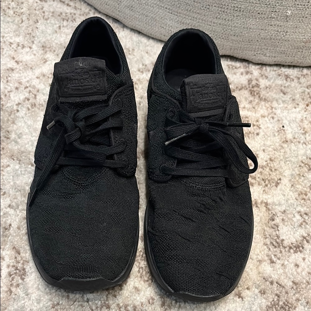 Black Nike Stefan Janoski Sneakers with Knit Upper and Rubber Sole